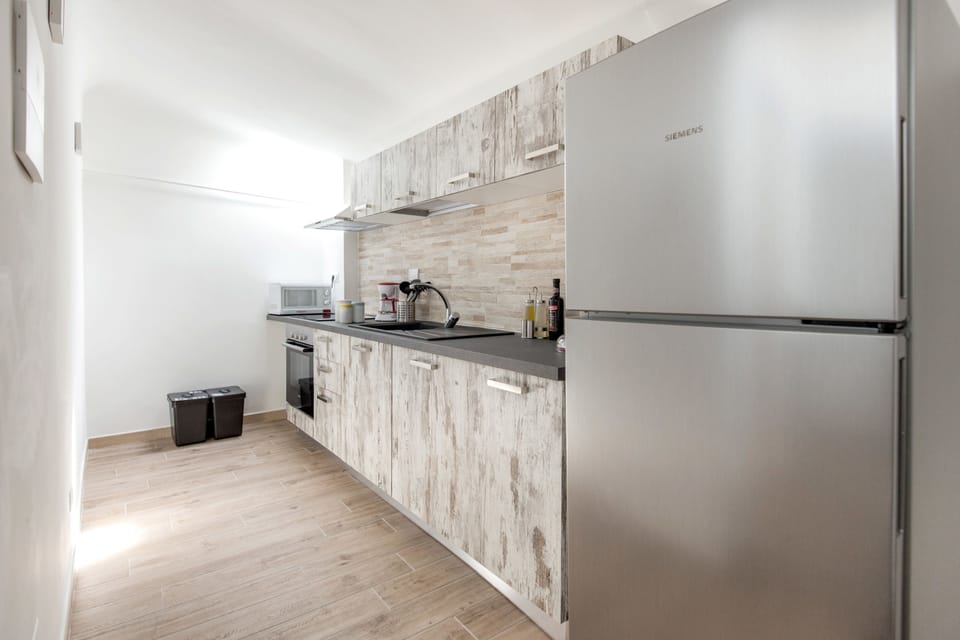 Camera familiare (raggiungibile con due rampe di scale) | Private kitchen | Fridge, espresso maker, coffee/tea maker, electric kettle