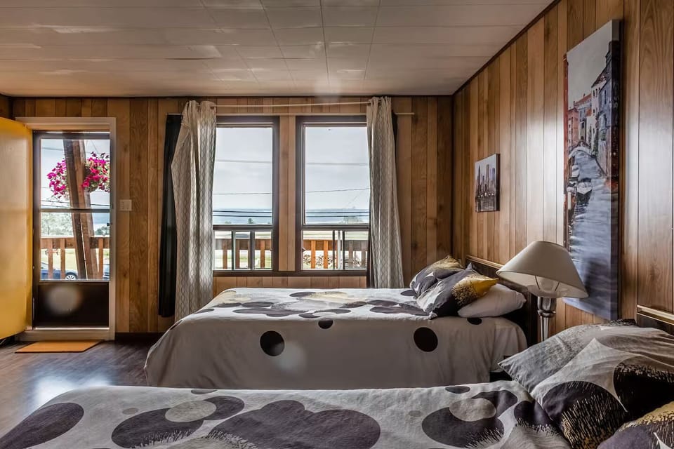 Family Room, 2 Double Beds | Individually decorated, desk, blackout drapes, iron/ironing board