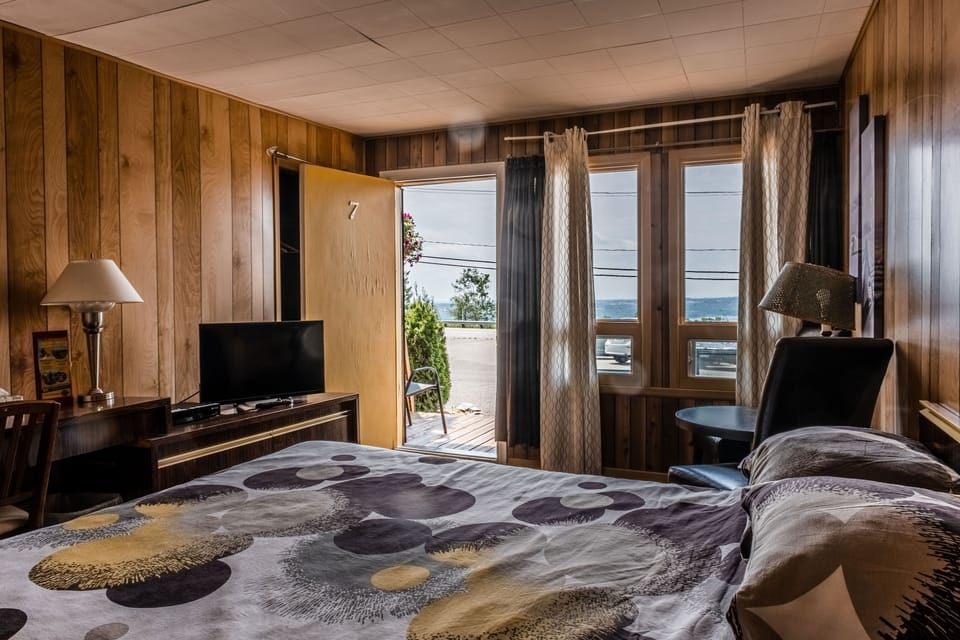 Family Room, 2 Double Beds | Individually decorated, desk, blackout drapes, iron/ironing board