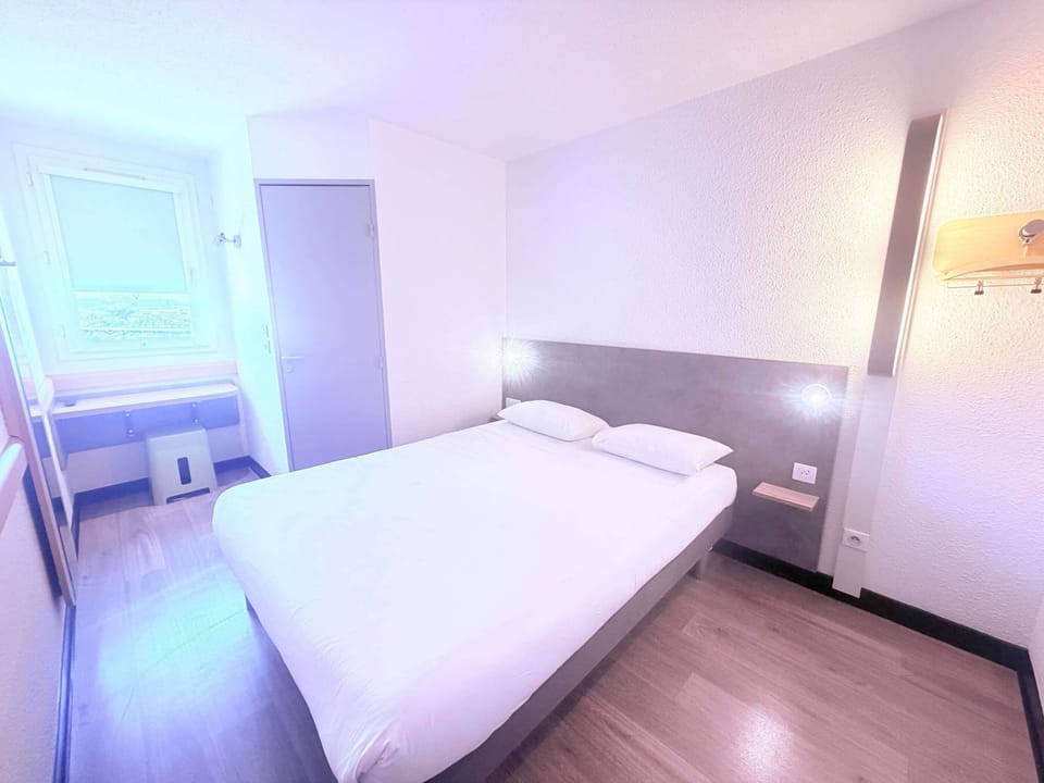 Double Room | Desk, blackout drapes, WiFi (free), bed sheets