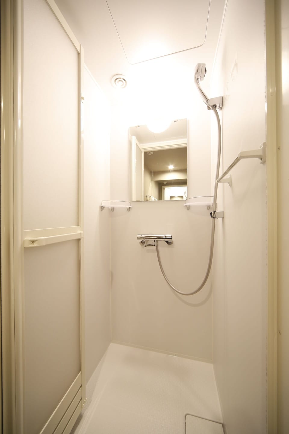 Shower, free toiletries, hair dryer, slippers