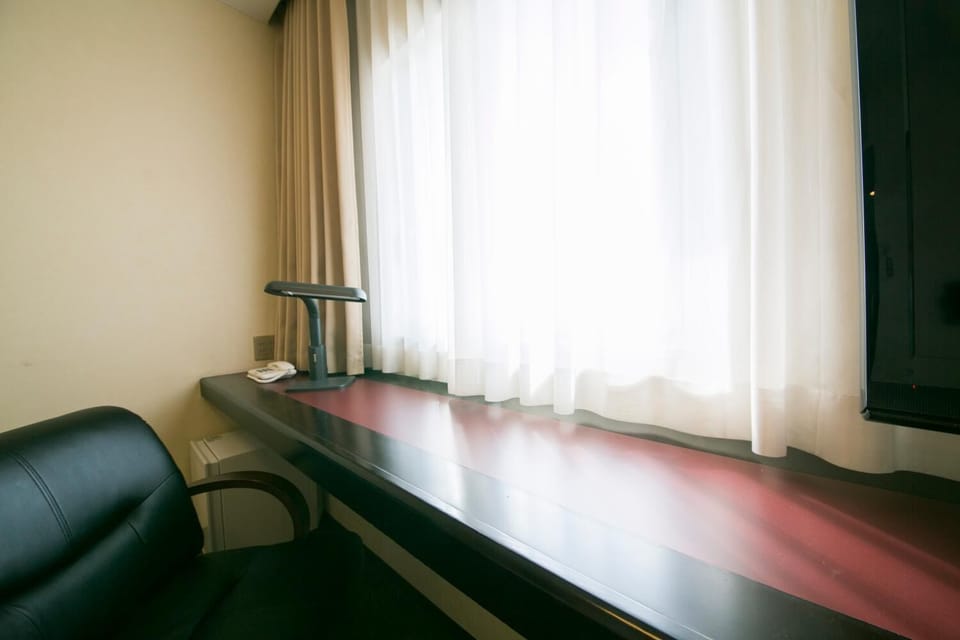Down comforters, desk, blackout drapes, free WiFi