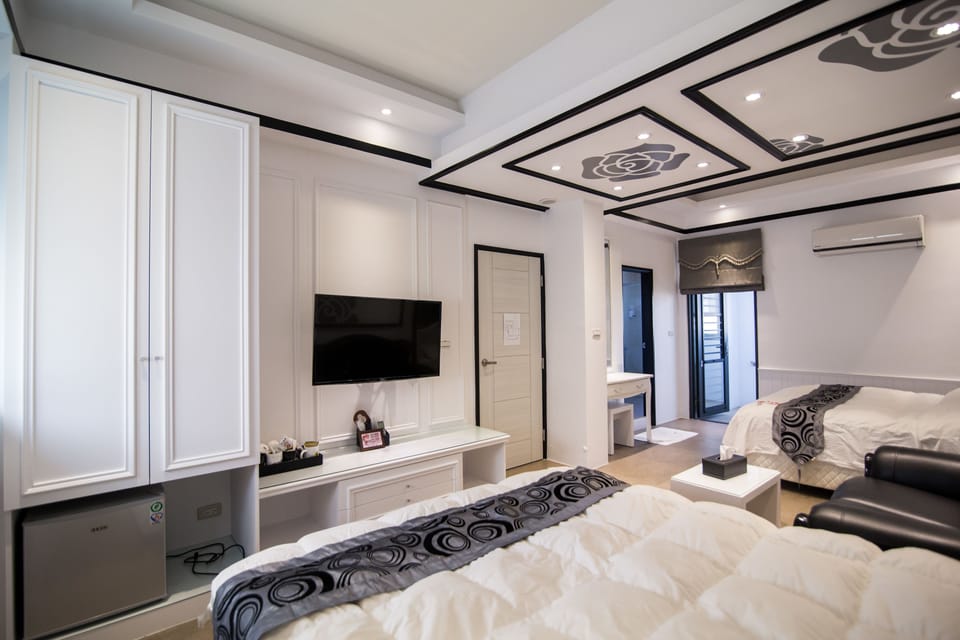 Design Quadruple Room, 2 Queen Beds, Balcony | Premium bedding, down comforters, pillowtop beds, individually decorated
