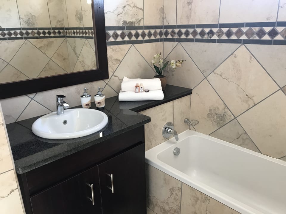 Separate tub and shower, deep soaking tub, towels