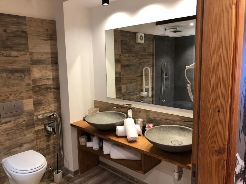 Hair dryer, bidet, towels, soap