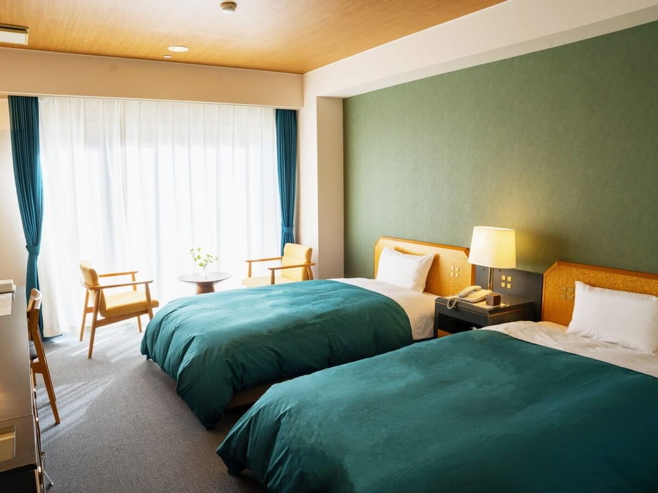 Twin Room | Desk, free WiFi, bed sheets