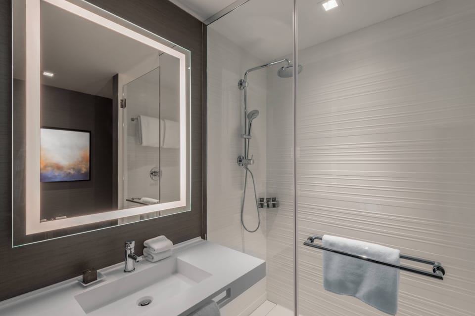 Classic Room, 2 Queen Beds | Bathroom | Shower, rainfall showerhead, free toiletries, hair dryer