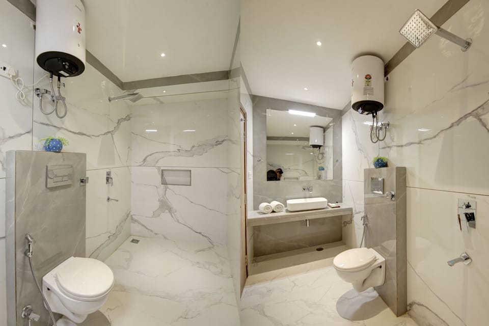 Family Room, 2 Double Beds, Non Smoking | Bathroom | Shower, bathrobes