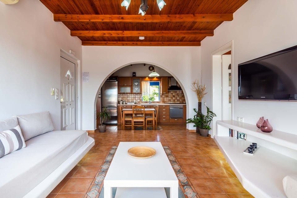 Basic Suite, Multiple Bedrooms, Kitchen, Sea Facing | Living room | Flat-screen TV