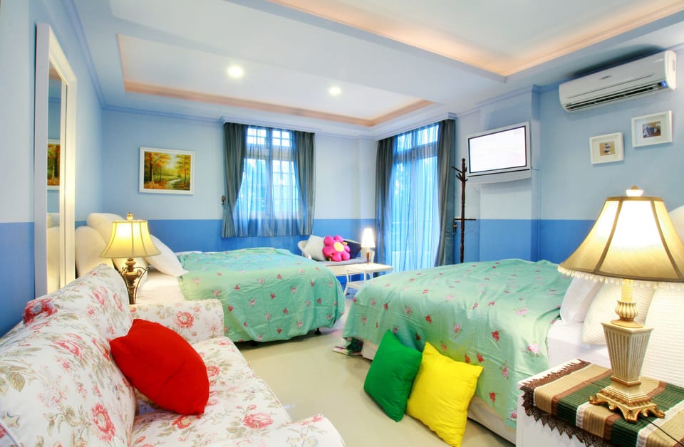 Comfort Quadruple Room | Premium bedding, down comforters, individually decorated