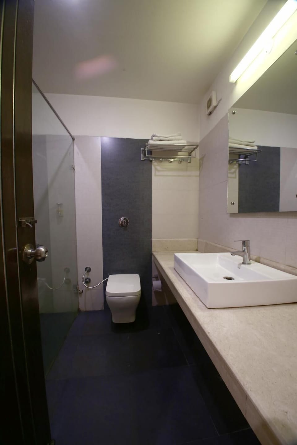 Shower, free toiletries, slippers, towels