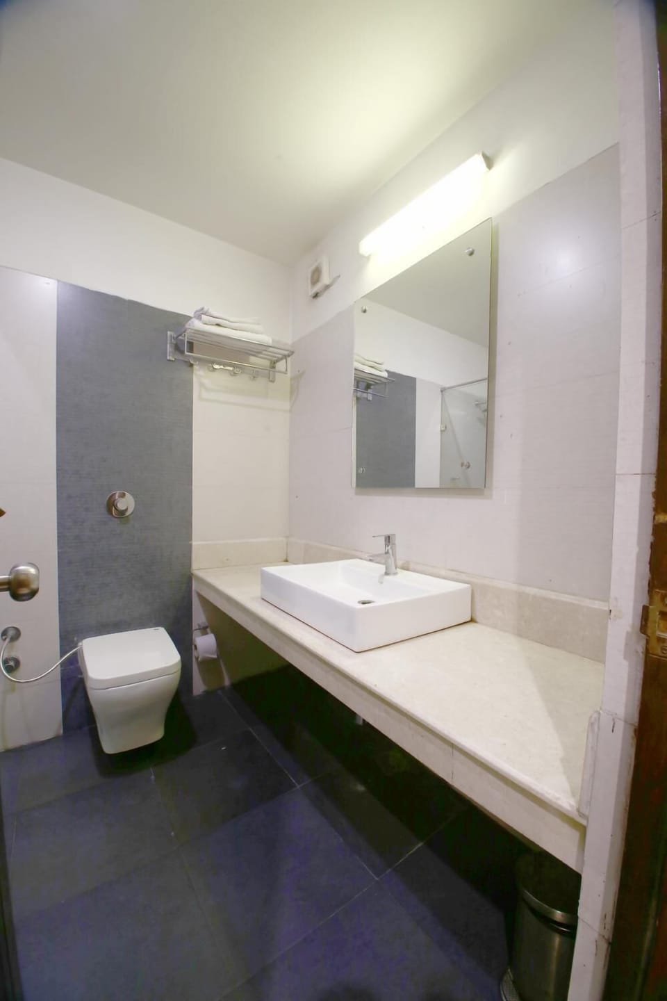 Shower, free toiletries, slippers, towels