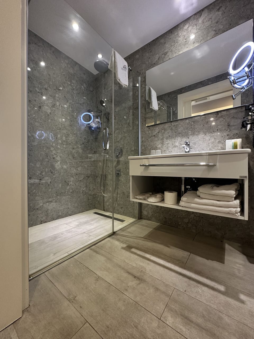 Shower, free toiletries, hair dryer, slippers