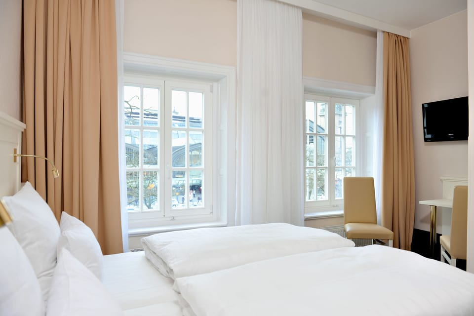 Hypo-allergenic bedding, in-room safe, desk, iron/ironing board