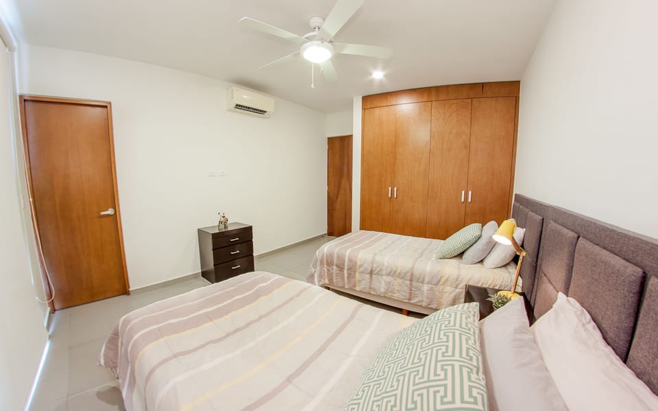 Deluxe Condo, 2 Bedrooms, Garden View, Courtyard Area | 2 bedrooms, in-room safe, iron/ironing board, free WiFi