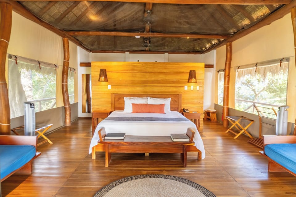 Master Sunset Suite | Minibar, in-room safe, individually decorated, individually furnished