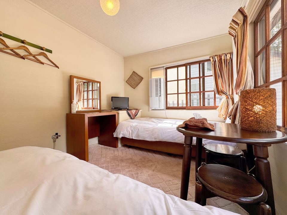 Twin Room, Private Bathroom | Free WiFi, bed sheets