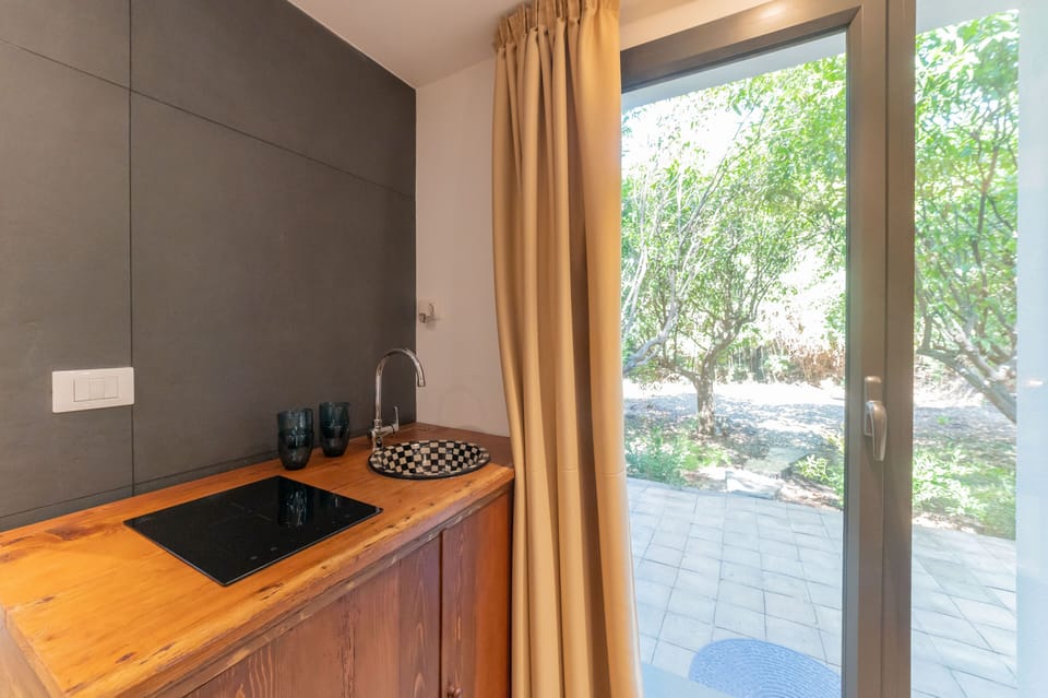 Deluxe Apartment, 1 Bedroom, Garden View (4 pax) | Private kitchen | Fridge, electric kettle