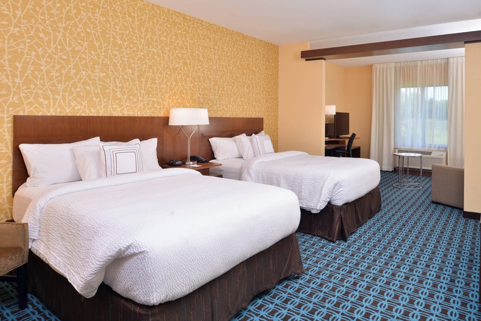 Suite, Multiple Beds | Pillowtop beds, desk, iron/ironing board, WiFi (free)