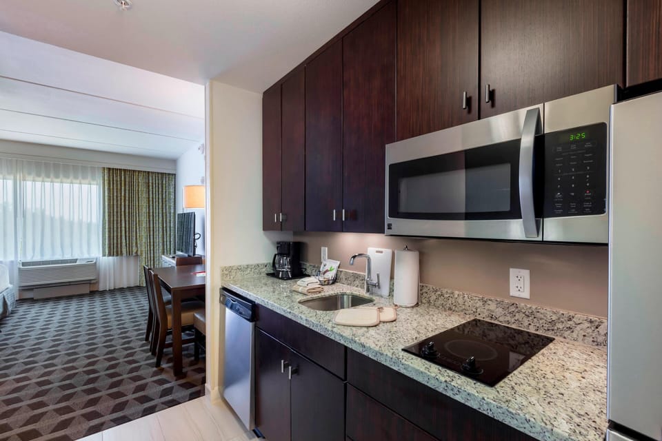 Family Studio Suite, 1 Bedroom | Private kitchen | Full-size fridge, microwave, stovetop, dishwasher