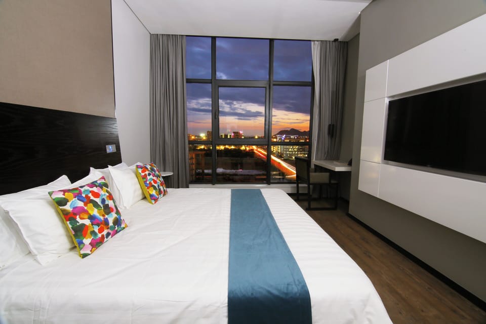 Standard Room, 1 King Bed, City View | In-room safe, desk, soundproofing, iron/ironing board (on request)
