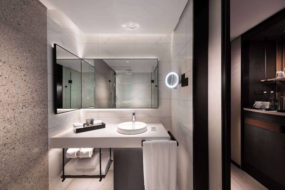 Eco-friendly toiletries, hair dryer, bathrobes, slippers