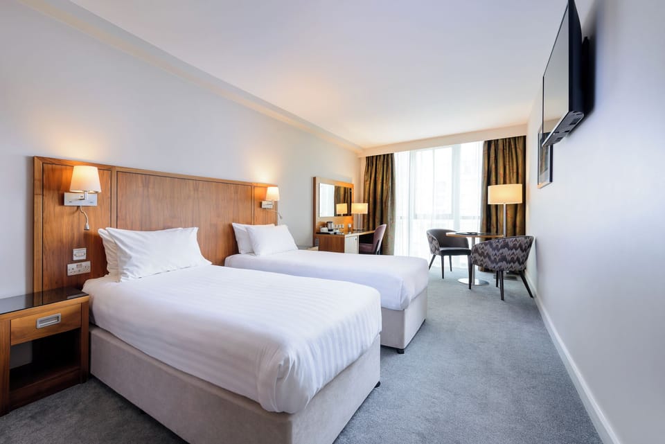 Twin Room, 2 Twin Beds | In-room safe, desk, soundproofing, iron/ironing board