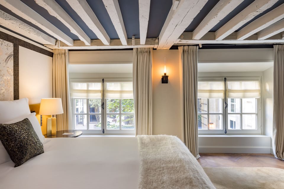 Family Duplex, 2 Bedrooms, Courtyard Area | Free minibar, in-room safe, individually decorated, desk