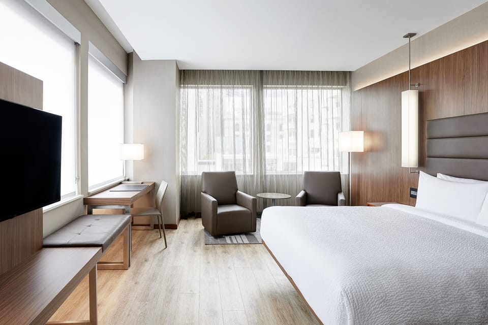 Room, 1 King Bed, Corner | In-room safe, desk, laptop workspace, iron/ironing board