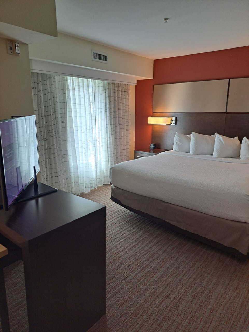 Desk, laptop workspace, iron/ironing board, free cribs/infant beds