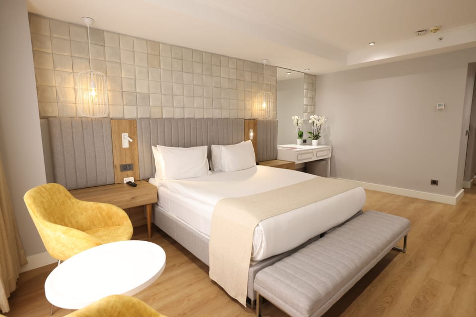 King Room | Premium bedding, in-room safe, blackout drapes, soundproofing