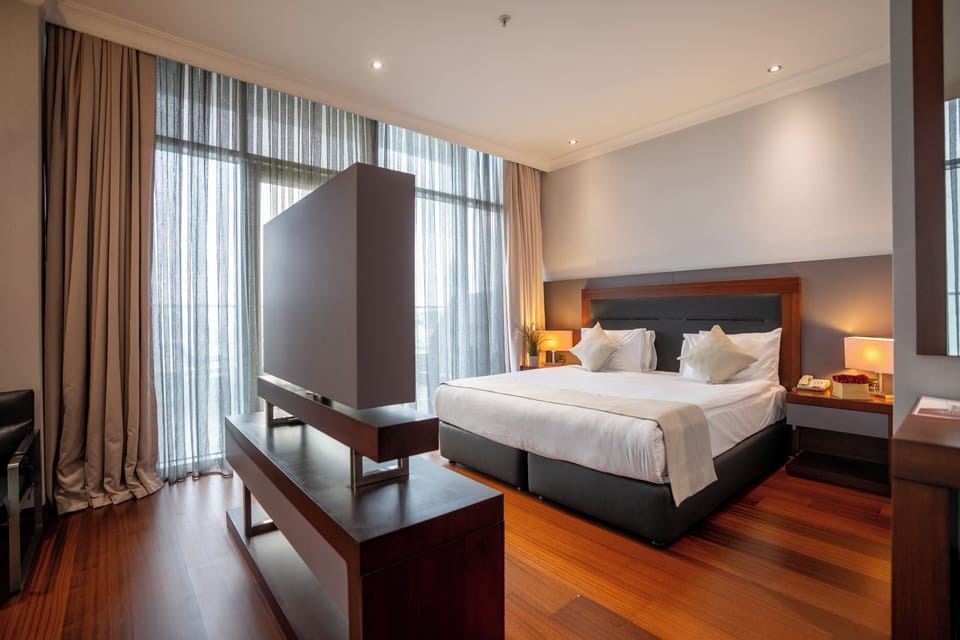 Sky Suite | Premium bedding, in-room safe, blackout drapes, soundproofing