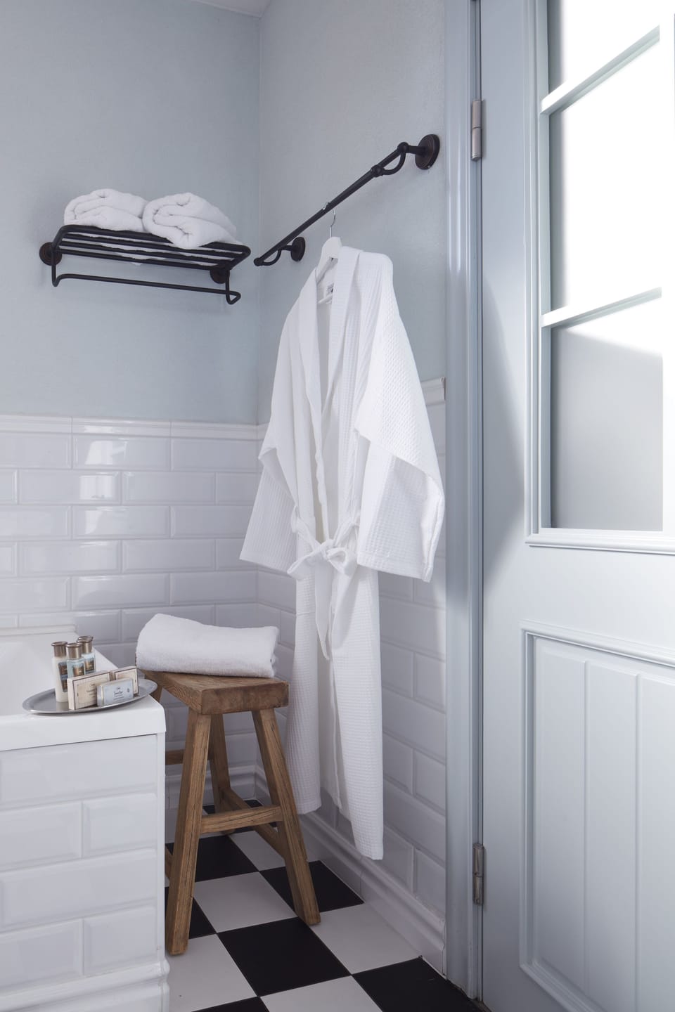 Designer toiletries, hair dryer, towels