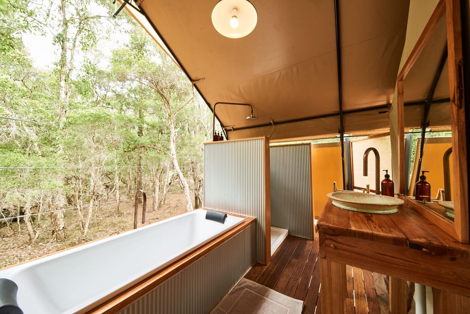 Deluxe Tent, 1 King Bed, Resort View | Bathroom | Eco-friendly toiletries, bathrobes, towels, soap