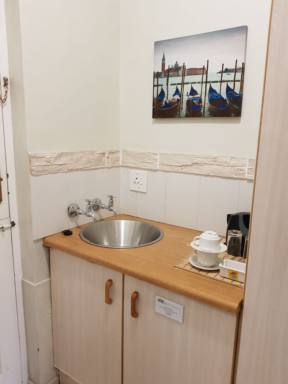 Fridge, electric kettle, cookware/dishes/utensils