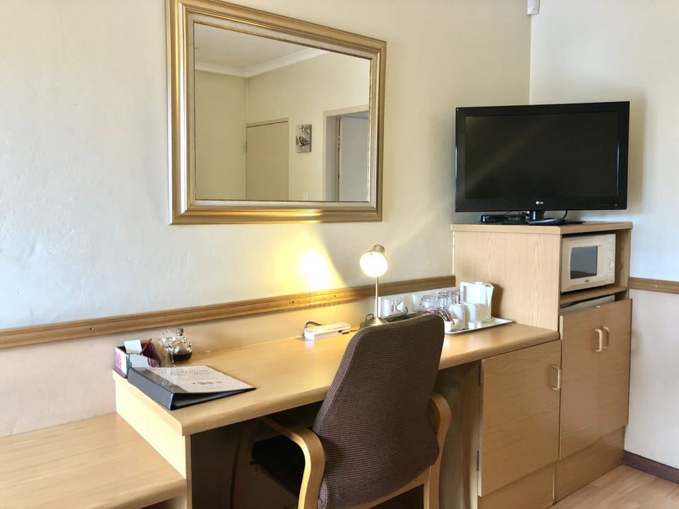 Standard Double Room | In-room safe, desk, laptop workspace, iron/ironing board