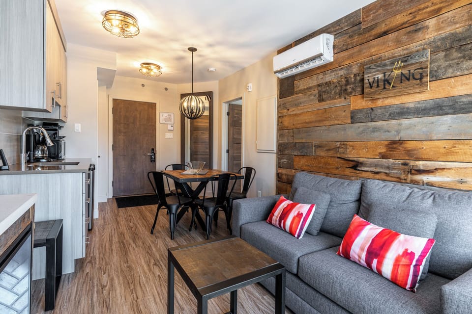 Spacious Studio Condo | Living area | 43-inch LED TV with cable channels, TV, fireplace