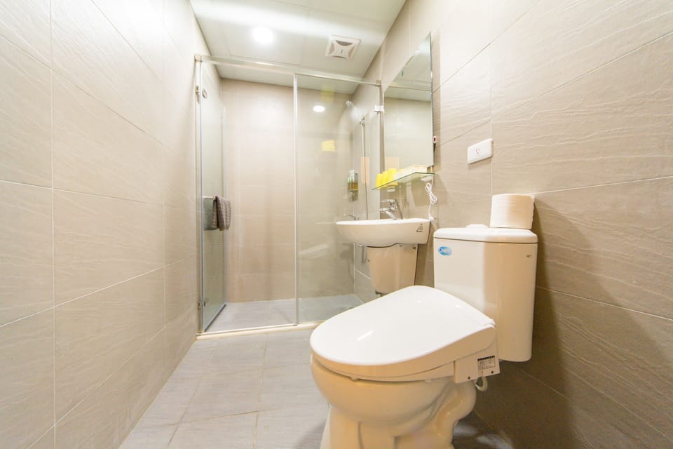 Shower, free toiletries, hair dryer, slippers