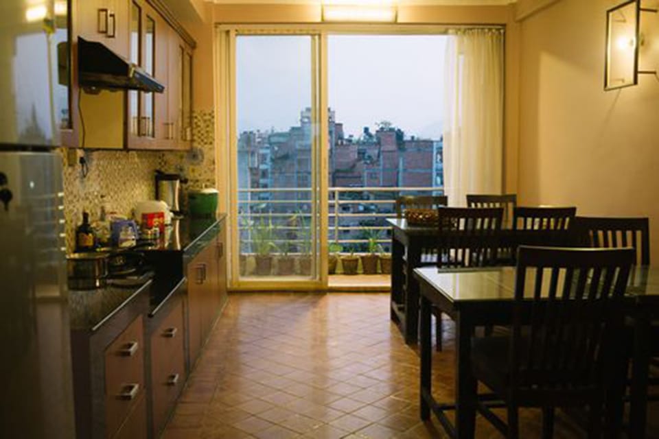 Mini-fridge, stovetop, electric kettle, rice cooker