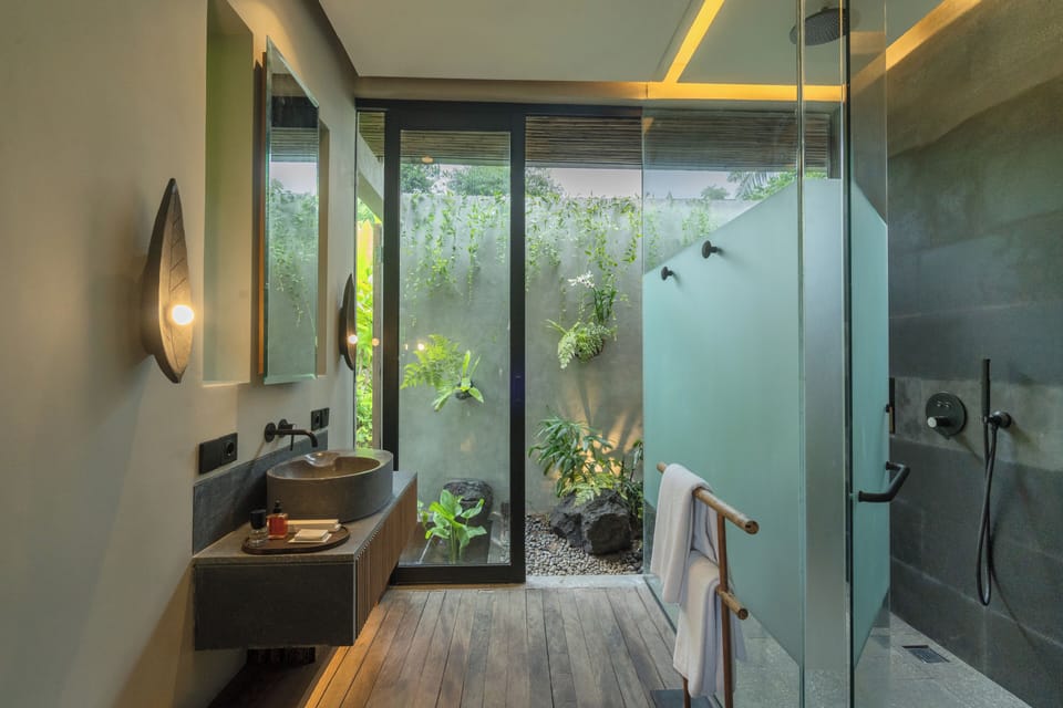 Separate tub and shower, free toiletries, hair dryer, slippers