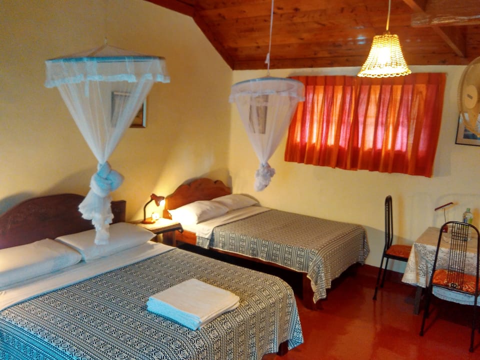 Standard Bungalow, 2 Bedrooms, Non Smoking, Garden View | 2 bedrooms, desk, free WiFi, bed sheets