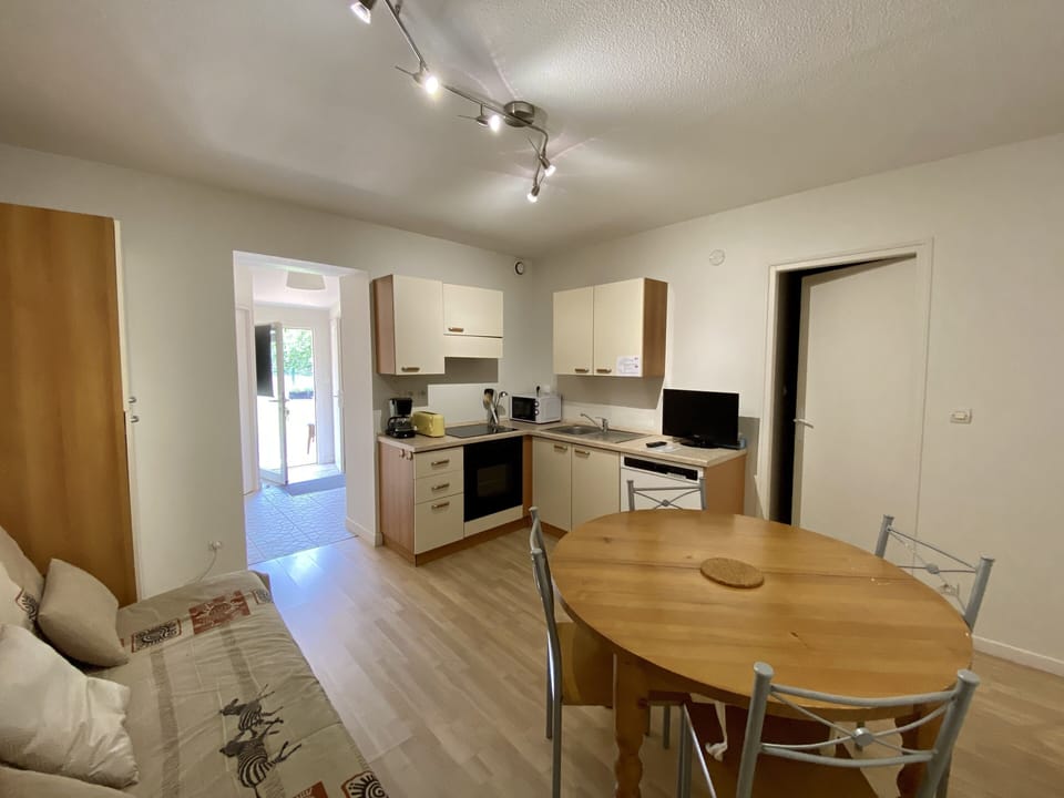 Family Apartment, 2 Bedrooms, Terrace (Ground Floor) | Living area | 55-cm flat-screen TV with digital channels, TV