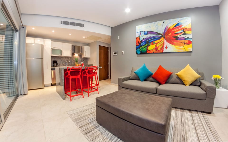 Deluxe Condo, 1 Bedroom, City View, Courtyard Area | Living area | Flat-screen TV