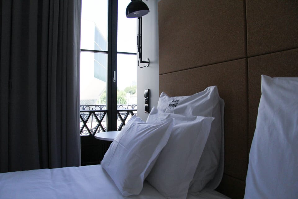 Deluxe Room, Balcony, City View | In-room safe, desk, blackout drapes, soundproofing