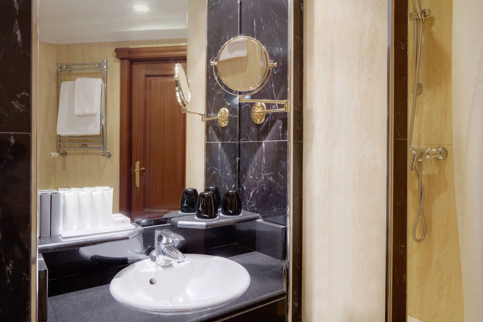 Eco-friendly toiletries, hair dryer, towels, shampoo