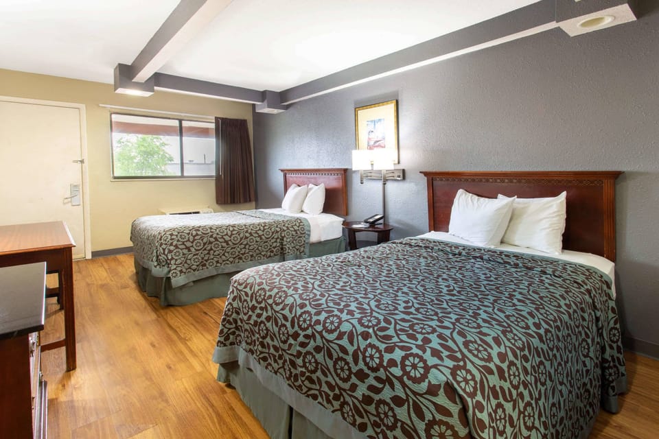 Desk, laptop workspace, free WiFi, bed sheets