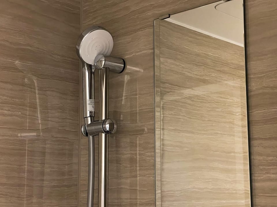 Lodging Building | Bathroom | Free toiletries, hair dryer, slippers, bidet