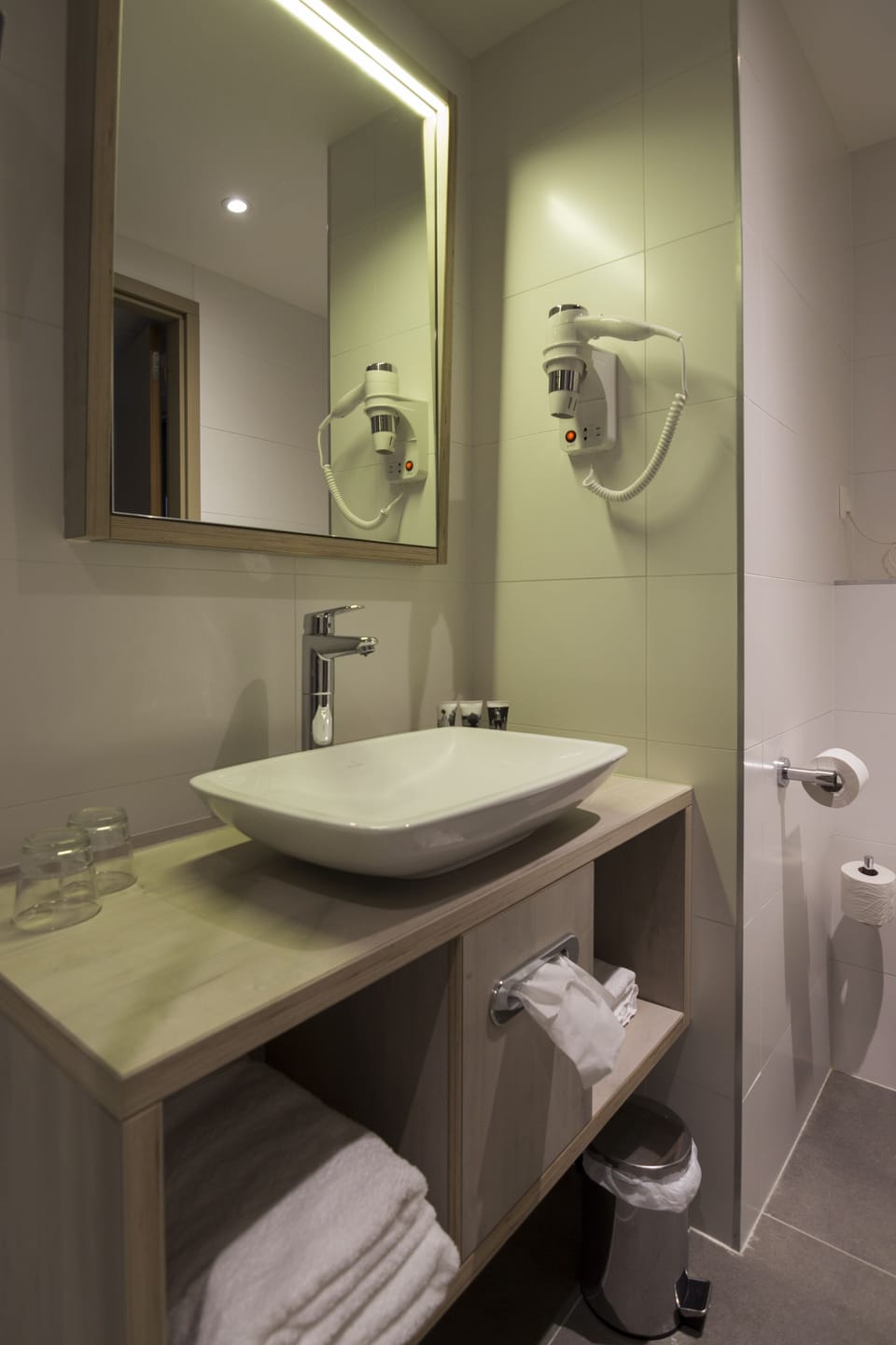 Shower, eco-friendly toiletries, hair dryer, towels