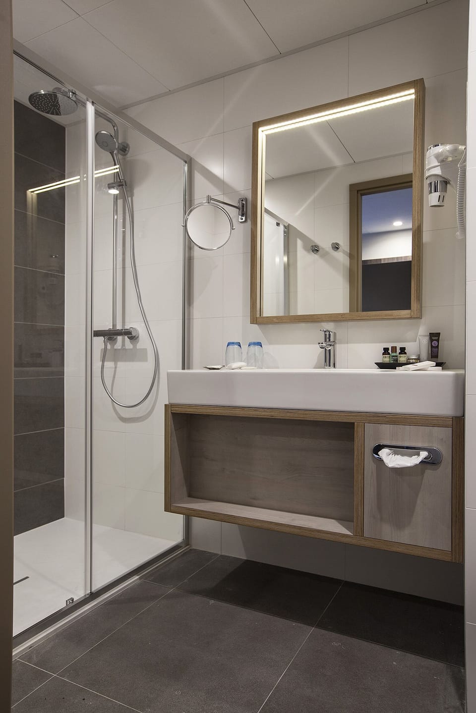 Shower, eco-friendly toiletries, hair dryer, towels