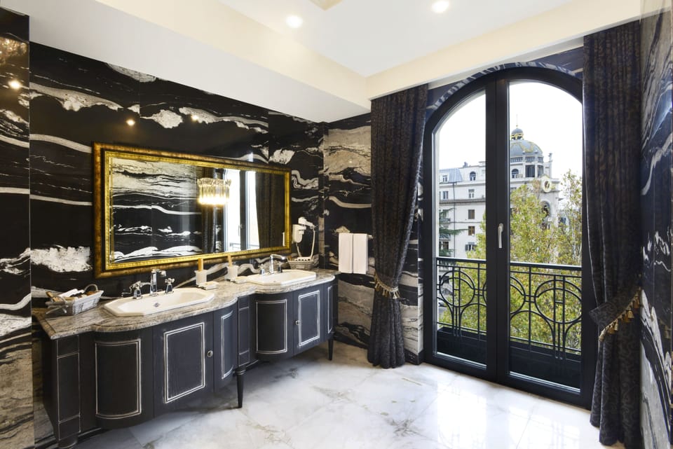Signature Suite, 1 Bedroom | Bathroom | Shower, free toiletries, hair dryer, slippers